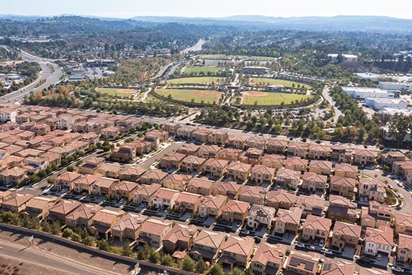 Aerial photograph of residential neighborhoods in the city of Lake Forest, Orange County, California and the surrounding hills